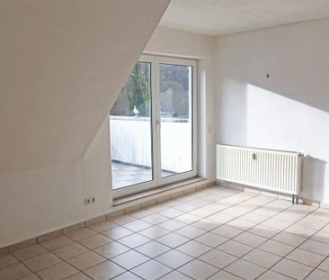 Dachgeschosswohnung mit Extras! - Foto 1