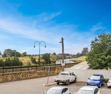 Industrial Loft Style Unit With Central Convenience & Water Views - Photo 1