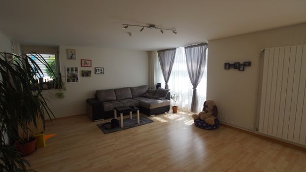 Spacieux appartement de 2.5 pièces en rez-de-chaussée - Photo 1