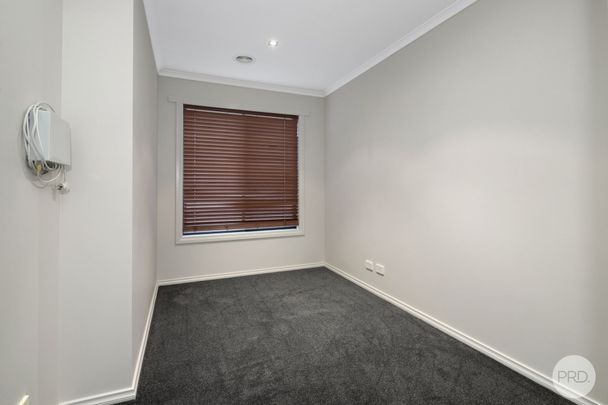 REFRESHED THREE BEDROOM HOME + STUDY IN COSY CANADIAN ESTATE - Photo 1