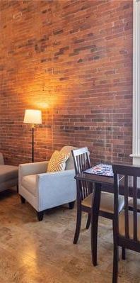 Full furnished, downtown heritage loft, move in ready. - Photo 1