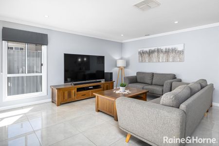 SPACIOUS FOUR-BEDROOM HOME - Photo 3