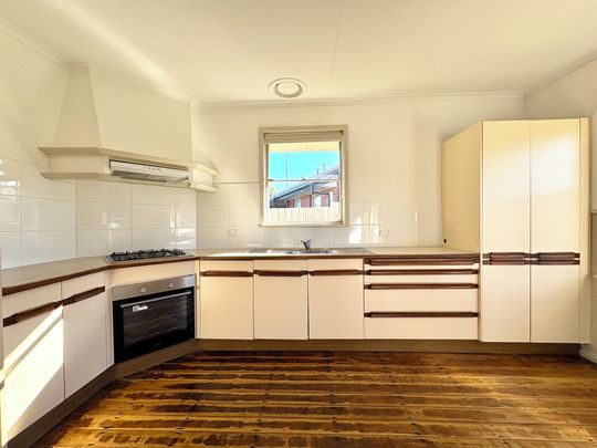 Charming Family Home in Prime Location - Photo 1