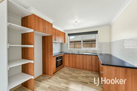 Hop, skip & jump to town - Photo 3