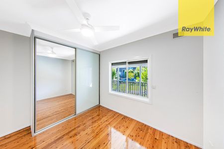 Stunningly Renovated 5-Bedroom Family Oasis with Pool and Garage! - Photo 2