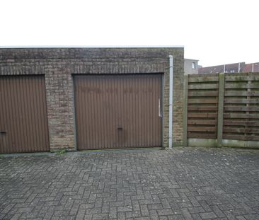 Een gelijkvloers appartement met 2 slaapkamers, tuin en garage. - Foto 4