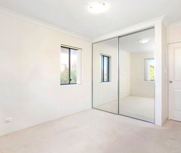Take a Walk on The Quiet Side with this Two Bedroom Unit - Photo 1
