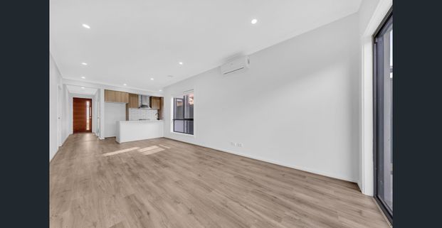 Spacious Family Home with Modern Comforts and Easy Maintenance - Photo 1