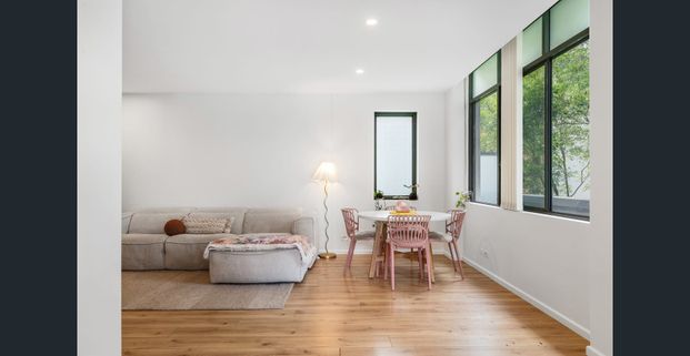 Spacious, Sun-Filled Living - Photo 1