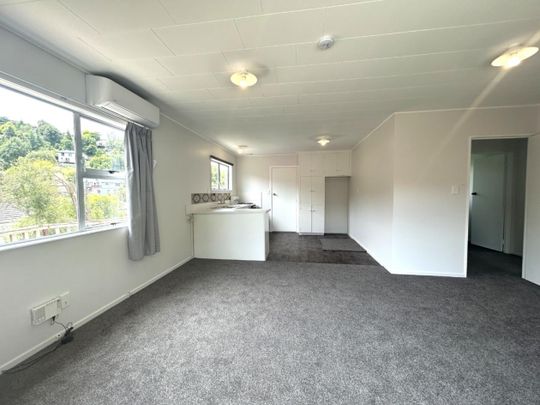 Freshly Updated 2 Bedroom Home Close to Schools and City - Ready Soon! - Photo 1