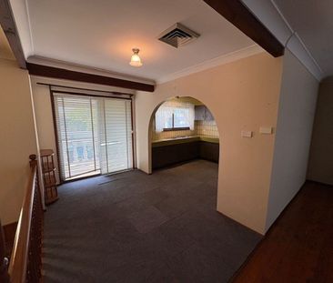Spacious Family Home with Multiple Living Areas & Water Included - Photo 1