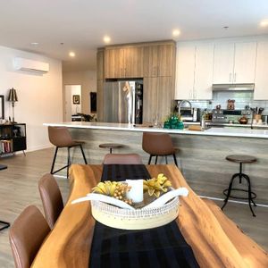 TOUT INCLUS - 4½ 1285 pi2 - PRÈS DU LAC BOIVIN / 1er ÉTAGE / ASCENSEUR / IMMENSE WALK-IN / 100% BÉTON / THERMOPOMPE - Logement à Granby - Photo 2