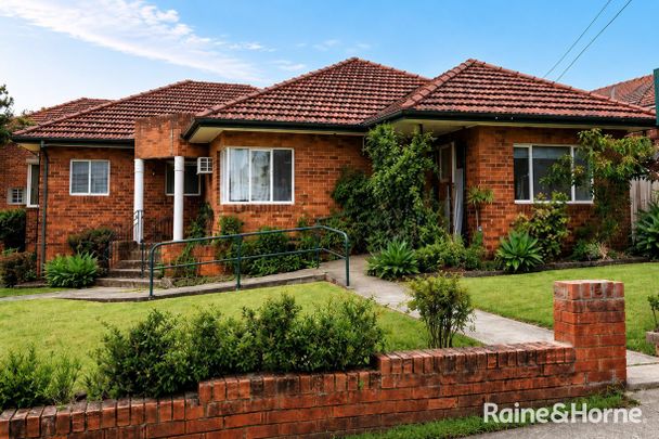 Perfect Spacious Family Home Located In Convenient Location - Photo 1