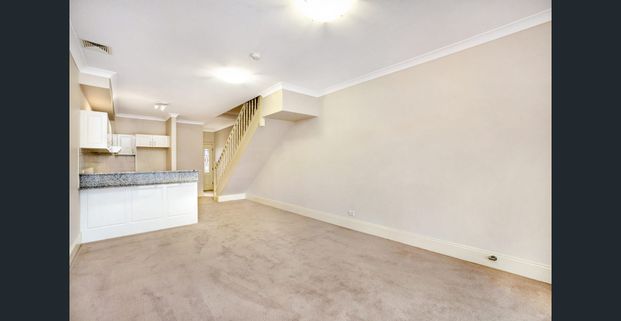 Townhouse is central locale - Photo 1