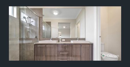 Welcome to this stunning 4-bedroom, 2-bathroom home perfectly designed for modern family living. - Photo 2