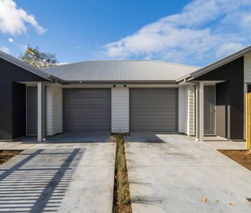 Modern new 2 bedroom Unit + Garage - Photo 2