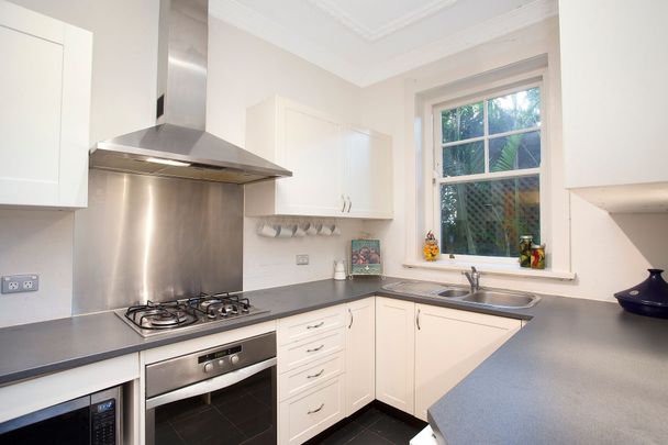 Elegant Garden Apartment - Unmatched Convenience & No Common Walls - Photo 1