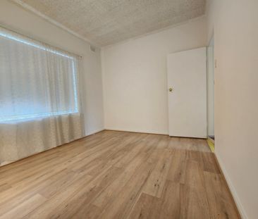 DOWNSTAIRS UNIT. SECURE AND IN A VERY CONVENIENT LOCATION - Photo 4