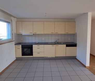 Appartement de 2,5 pièces au rez-de-chaussée - Photo 1