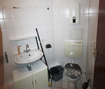 1,5-Zimmerwohnung mit Einbauküche in modernem Mehrfamilienhaus - Foto 1