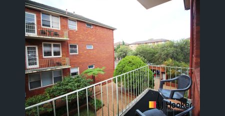 Situated on the first floor of a well maintained security building, this cozy one bedroom apartment features - Photo 3