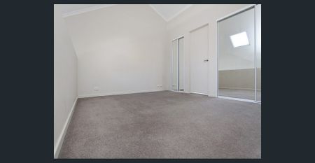 Stylish Two-Storey Loft in Prime Newtown Location - Photo 3