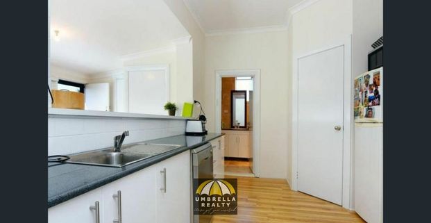 Comfortable Living in a Charming Two-Bedroom Home - Photo 1