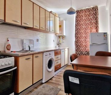 Apartament cu 2 camere, gradina si parcare de inchiriat - Fotografie 2