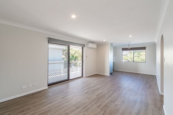 Beautifully Renovated Unit - Quiet Elevated Location, Easy Walk to Main Street Busway Station. - Photo 1