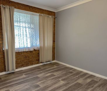 Perfectly Positioned 2-Bedroom Unit - Photo 4