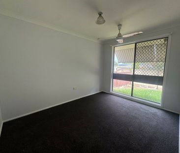 Updated Three-Bedroom Home with Swimming Pool - Photo 5