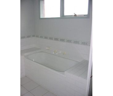 PRIMELY LOCATED FOUR BEDROOM FAMILY HOME! - Photo 4