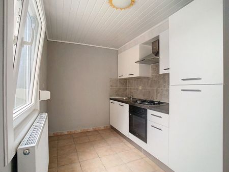 Ruime woning met 3 SLPK, tuin én garage! - Photo 3