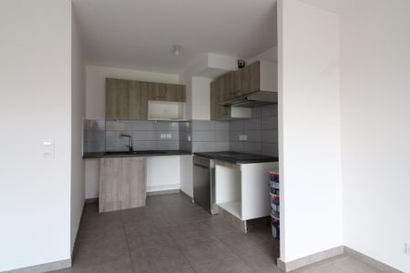 Location Appartement 4 pièces 90m² CORNEBARRIEU 31700 - Photo 3