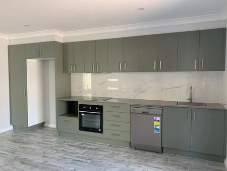 Near-new unit offering low-maintenance living - Photo 3