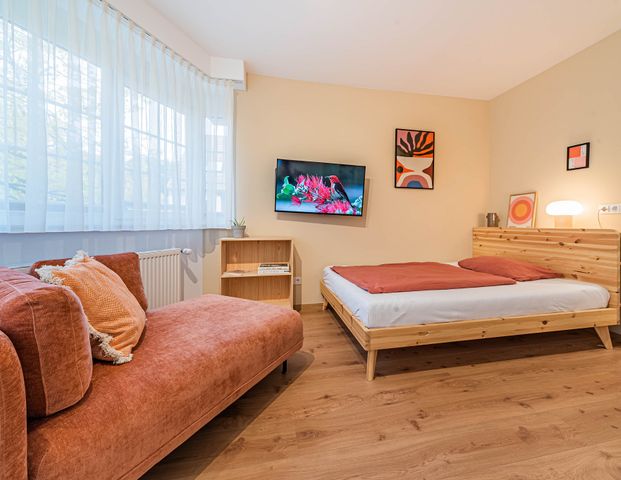 City-Residence: Gepflegtes 1-Zimmer-Apartment mit W-LAN und Reinigungsservice - Photo 1