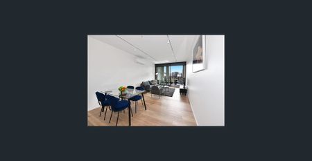 Luxury CBD Apartment — Walk to Uni, Victoria Market & Free Transport! Just Bring Your Suitcase for Exclusive Furnished Living - Photo 2