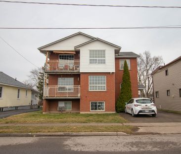 Bright & Updated 2-Bedroom Unit with Parking - Photo 3