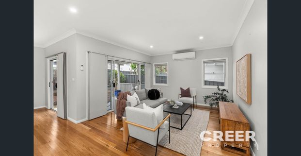 PRIVATELY NESTLED LARGE TOWNHOUSE - Photo 1