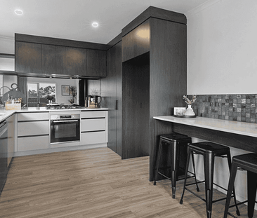 Stylishly Renovated – Modern 3 Bedroom Home - Photo 4