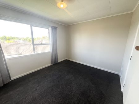 Step into comfort and convenience with this upstairs unit, freshly updated with brand new carpet throughout. - Photo 2