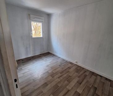 T4 AU 112 RUE LEON JOUHAUX - Photo 6