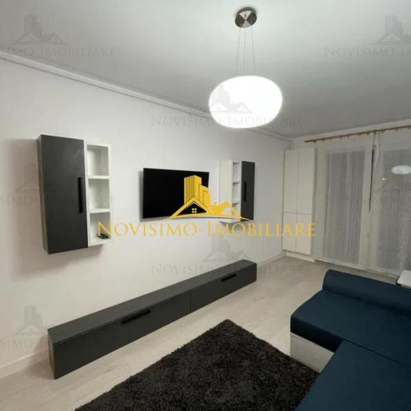 NOVISIMO-IMOBILIARE: APARTAMENT CU DOUA CAM. IN ZONA B-DUL BUCURESTI de inchiriat - Fotografie 1