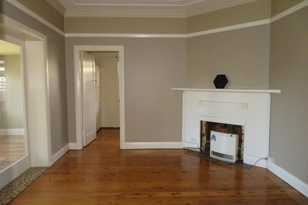 BEAUTIFULLY MAINTAINED AND CENTRAL HOME! - Photo 1