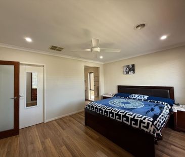 Spacious 4-Bedroom Home with Two Living Areas and Modern Upgrades - Photo 5