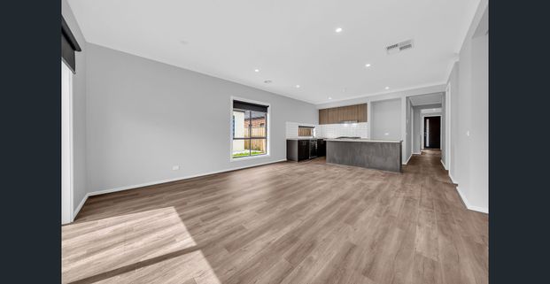 Modern 4-Bedroom Family Home in Prime Tarneit Place Estate Location - Photo 1