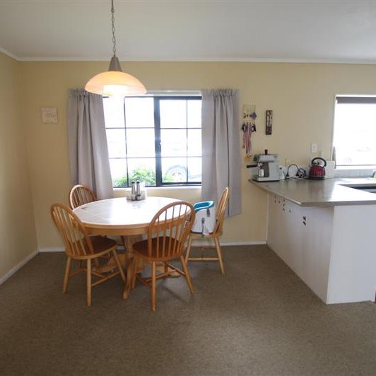 Spacious Family Home with Reserve Outlook, Large Fenced Garden & Covered Deck - Photo 1