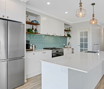 Near New Family Home in Award Winning Estate! - Photo 6