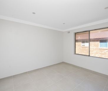 Modern Unit in a Highly Sought After Location - Photo 2