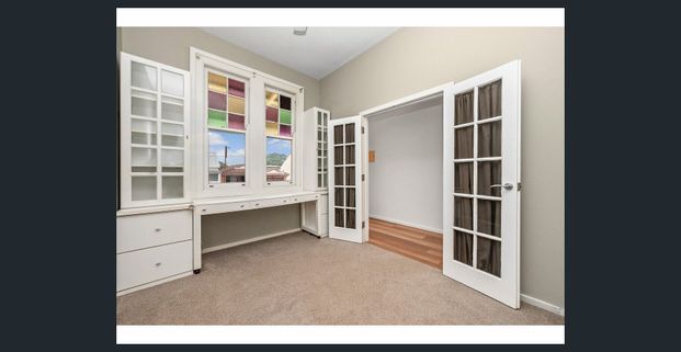 IMPRESSIVE RENOVATED & AIR-CONDITONED HISTORIC HOME IN SOUGHT AFTER LOCATION - Photo 1